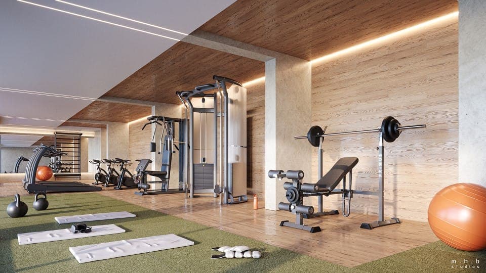 Academia moderna do condomínio Lanai Recreio com equipamentos de musculação, área de ergometria e design contemporâneo pela Calçada e Montserrat.
