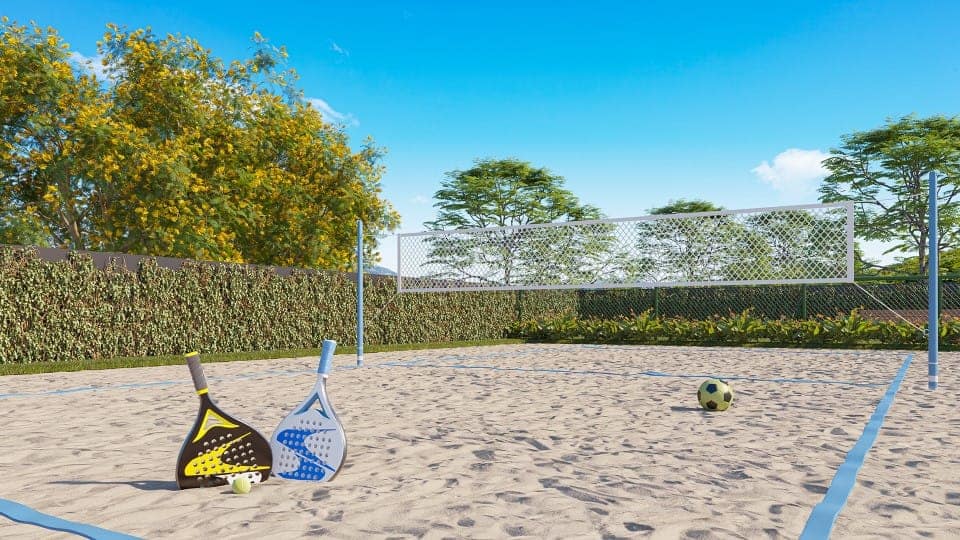 Quadra de areia para Beach Tênis e Futevôlei no Lanai Recreio Pontal Oceânico, cercada por paisagismo natural e infraestrutura esportiva completa.